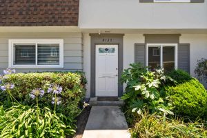 exterior entry showing white front door