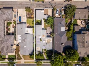birds eye view of home for sale with an outline showing property lines.