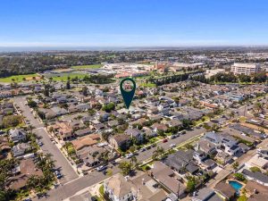 aerial view of home for sale in a suburban area of huntington beach, california.