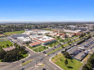 aerial view of large school in huntington beach, california.