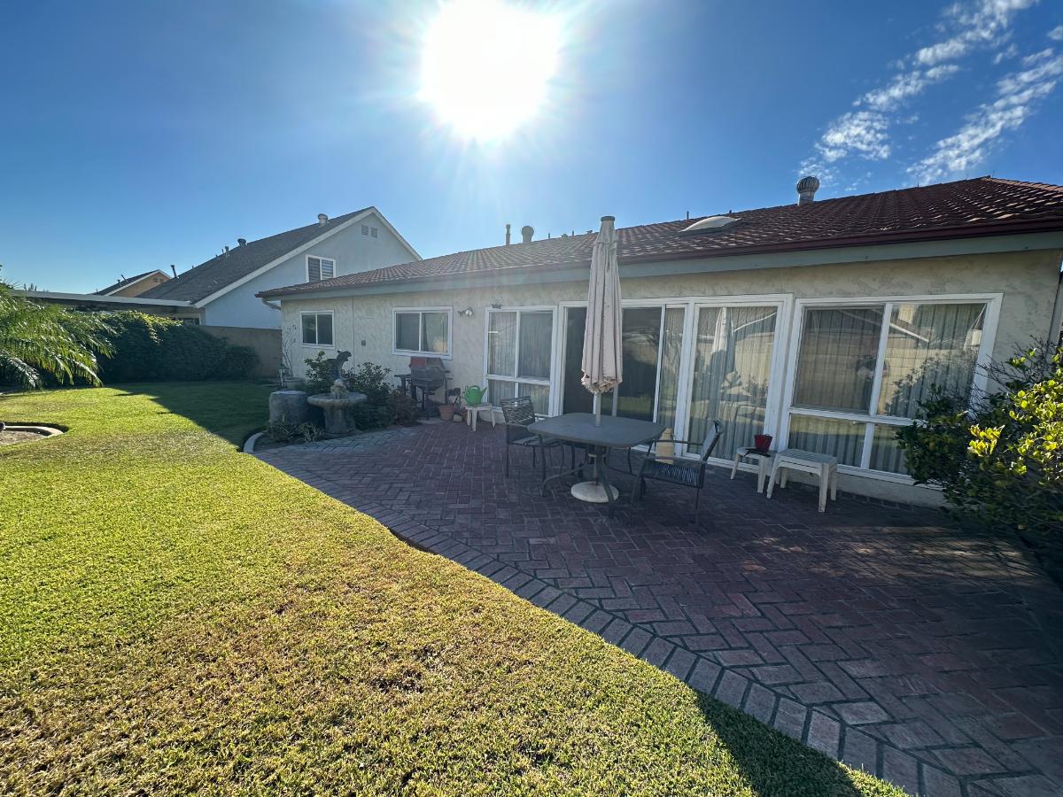 Back view of a house that needs repair. 