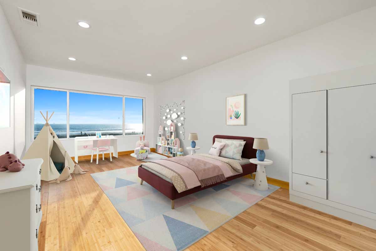 Updated and staged bedroom with wood floors, white walls and a large window overlooking the beach and ocean.