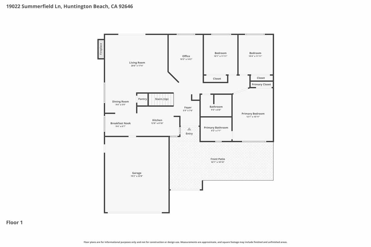 First floor floor plan showing four bedroom, a kitchen, a living room, staircase, bathroom and a two-car garage.