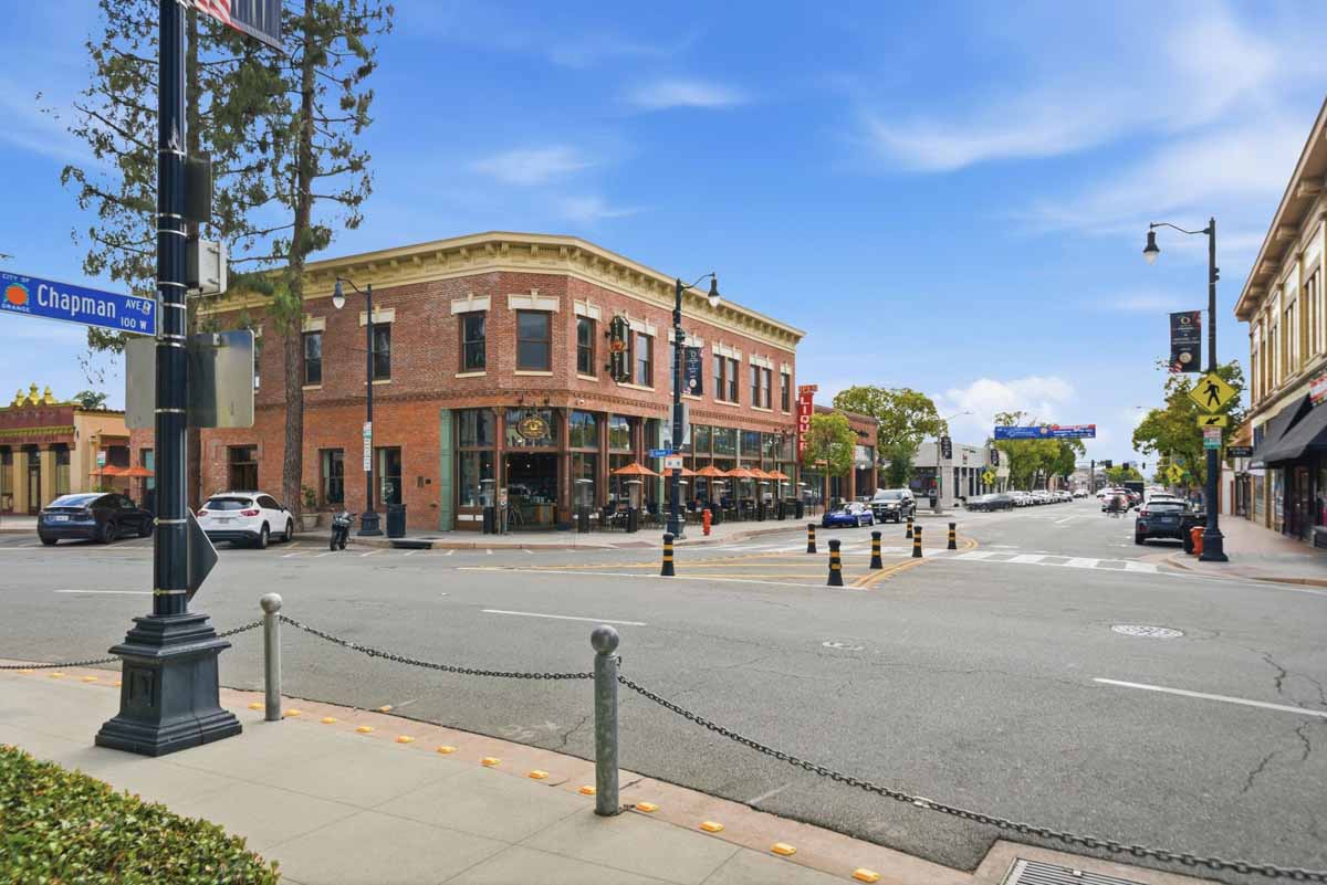 Old town Orange showing a street view of an historic brick, two-story building.