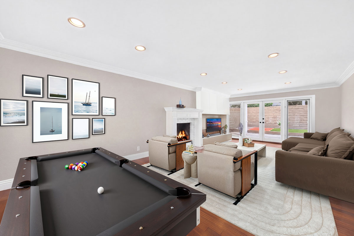 Digitally staged family room with pool table and couches.